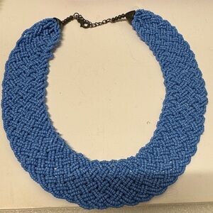 Vintage wide, chunky, light blue glass bead plaited necklace with braided design